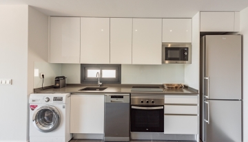 Resa Estates Ibiza te koop appartement Vadella Mar zee zicht kitchen.jpg